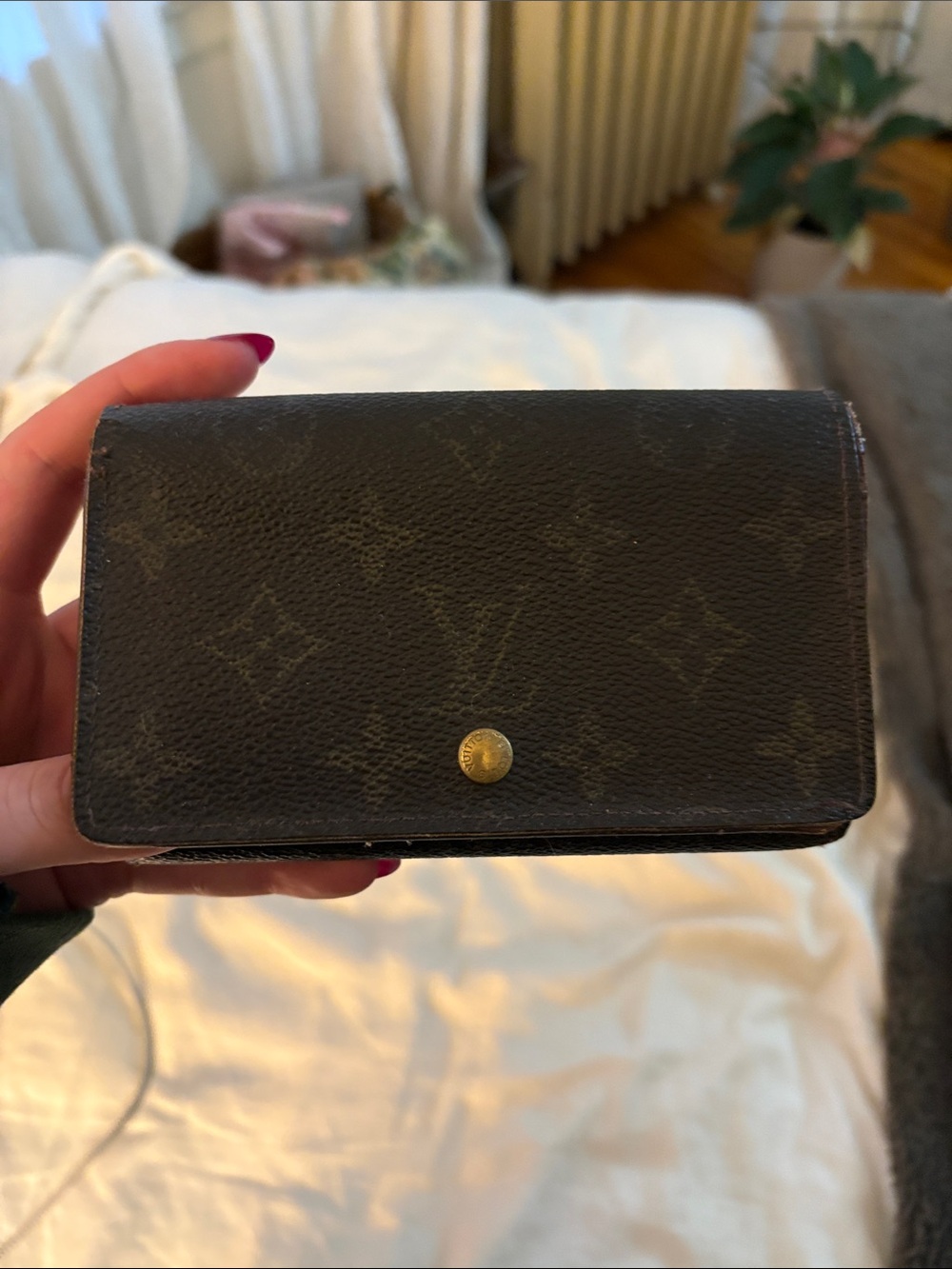 Monogram Canvas Fold Wallet in Dark Brown. Louis Vuitton.